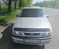 Серый Опель Вектра, объемом двигателя 1.69 л и пробегом 355 тыс. км за 1700 $, фото 1 на Automoto.ua