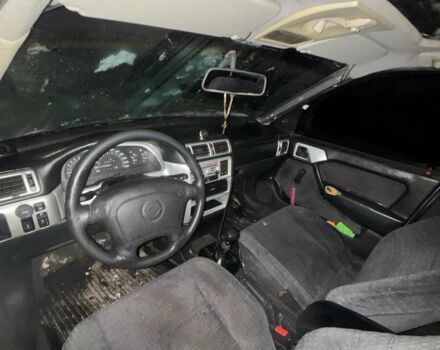 Серый Опель Вектра, объемом двигателя 1.8 л и пробегом 200 тыс. км за 550 $, фото 4 на Automoto.ua