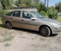 Серый Опель Вектра, объемом двигателя 1.69 л и пробегом 281 тыс. км за 1750 $, фото 5 на Automoto.ua