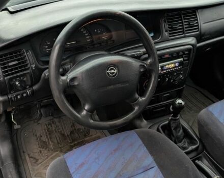 Серый Опель Вектра, объемом двигателя 1.8 л и пробегом 234 тыс. км за 1999 $, фото 9 на Automoto.ua