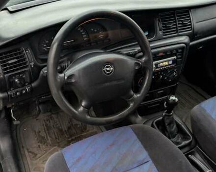 Серый Опель Вектра, объемом двигателя 1.8 л и пробегом 234 тыс. км за 1999 $, фото 7 на Automoto.ua