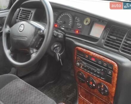 Серый Опель Вектра, объемом двигателя 2 л и пробегом 292 тыс. км за 1900 $, фото 3 на Automoto.ua