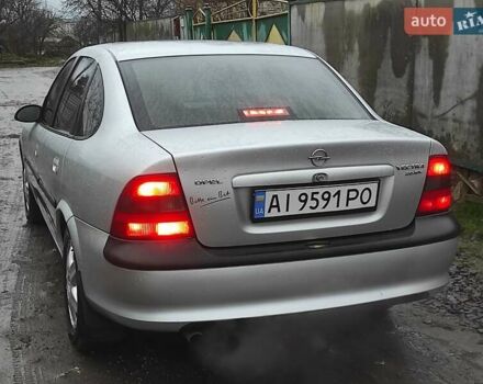 Серый Опель Вектра, объемом двигателя 2 л и пробегом 292 тыс. км за 1900 $, фото 1 на Automoto.ua