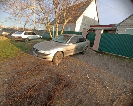 Серый Опель Вектра, объемом двигателя 2 л и пробегом 250 тыс. км за 1350 $, фото 1 на Automoto.ua