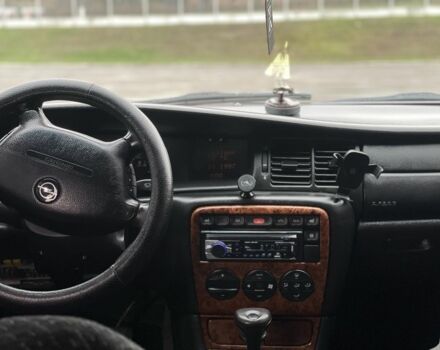 Серый Опель Вектра, объемом двигателя 2 л и пробегом 330 тыс. км за 2500 $, фото 5 на Automoto.ua