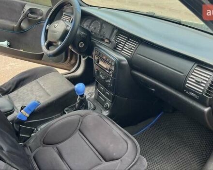 Серый Опель Вектра, объемом двигателя 1.6 л и пробегом 350 тыс. км за 2429 $, фото 6 на Automoto.ua