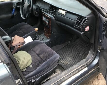 Серый Опель Вектра, объемом двигателя 2 л и пробегом 385 тыс. км за 2063 $, фото 6 на Automoto.ua