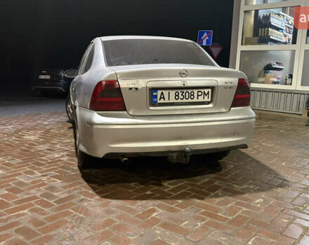 Сірий Опель Вектра, об'ємом двигуна 1.8 л та пробігом 320 тис. км за 1950 $, фото 4 на Automoto.ua