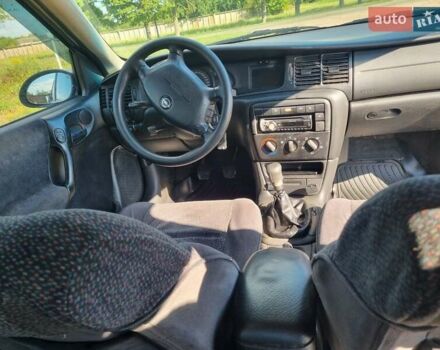 Серый Опель Вектра, объемом двигателя 2 л и пробегом 262 тыс. км за 3200 $, фото 7 на Automoto.ua