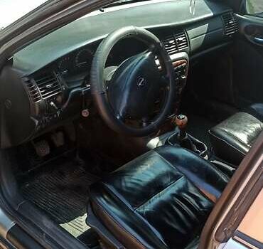 Сірий Опель Вектра, об'ємом двигуна 2.2 л та пробігом 468 тис. км за 2000 $, фото 10 на Automoto.ua