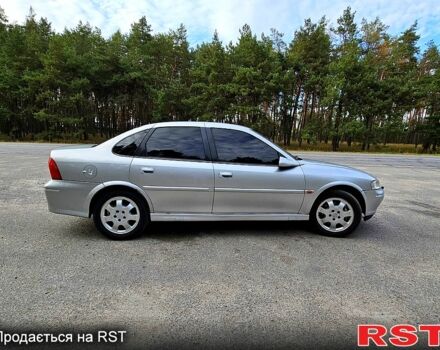 Серый Опель Вектра, объемом двигателя 1.8 л и пробегом 314 тыс. км за 3500 $, фото 4 на Automoto.ua