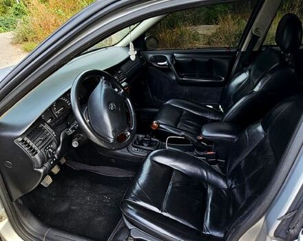 Серый Опель Вектра, объемом двигателя 1.8 л и пробегом 314 тыс. км за 3500 $, фото 6 на Automoto.ua