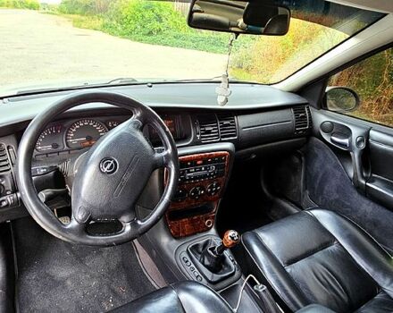 Серый Опель Вектра, объемом двигателя 1.8 л и пробегом 314 тыс. км за 3500 $, фото 2 на Automoto.ua