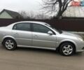 Серый Опель Вектра, объемом двигателя 1.8 л и пробегом 158 тыс. км за 8000 $, фото 1 на Automoto.ua