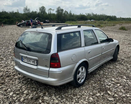 Сірий Опель Вектра, об'ємом двигуна 2 л та пробігом 320 тис. км за 1999 $, фото 3 на Automoto.ua