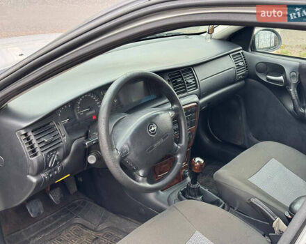 Серый Опель Вектра, объемом двигателя 2 л и пробегом 210 тыс. км за 2999 $, фото 9 на Automoto.ua