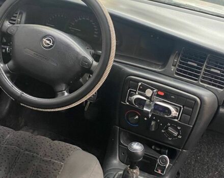 Серый Опель Вектра, объемом двигателя 1.5 л и пробегом 200 тыс. км за 2200 $, фото 6 на Automoto.ua