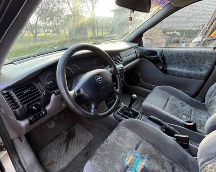 Серый Опель Вектра, объемом двигателя 2 л и пробегом 290 тыс. км за 500 $, фото 4 на Automoto.ua