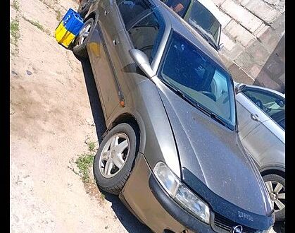 Сірий Опель Вектра, об'ємом двигуна 2.5 л та пробігом 123 тис. км за 2000 $, фото 1 на Automoto.ua