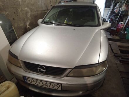 Серый Опель Вектра, объемом двигателя 2 л и пробегом 340 тыс. км за 828 $, фото 1 на Automoto.ua