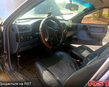 Синий Опель Вектра, объемом двигателя 2 л и пробегом 248 тыс. км за 1500 $, фото 3 на Automoto.ua