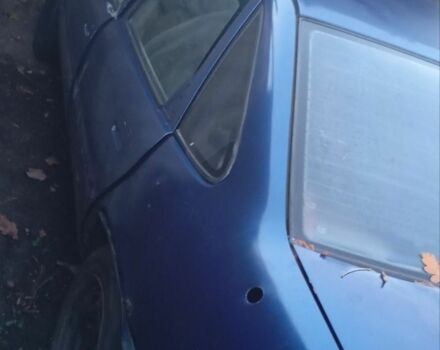 Синий Опель Вектра, объемом двигателя 1 л и пробегом 300 тыс. км за 357 $, фото 1 на Automoto.ua