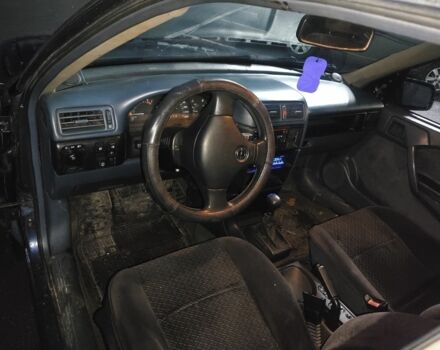 Синій Опель Вектра, об'ємом двигуна 2 л та пробігом 250 тис. км за 2000 $, фото 4 на Automoto.ua