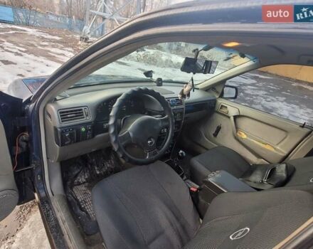 Синий Опель Вектра, объемом двигателя 1.8 л и пробегом 150 тыс. км за 1690 $, фото 6 на Automoto.ua