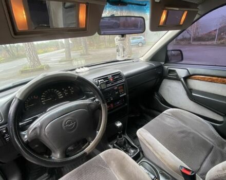 Синий Опель Вектра, объемом двигателя 2 л и пробегом 407 тыс. км за 1650 $, фото 4 на Automoto.ua