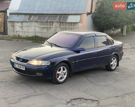Синий Опель Вектра, объемом двигателя 1.8 л и пробегом 260 тыс. км за 1750 $, фото 2 на Automoto.ua