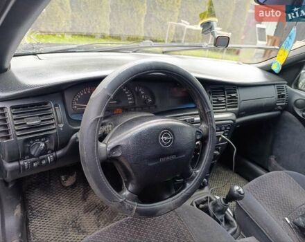 Синий Опель Вектра, объемом двигателя 1.8 л и пробегом 264 тыс. км за 1700 $, фото 5 на Automoto.ua