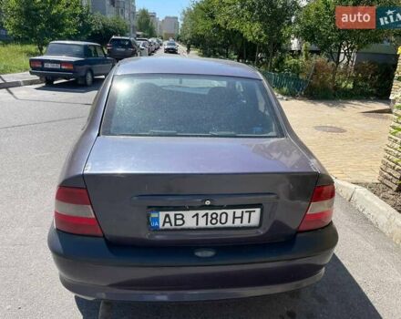 Синій Опель Вектра, об'ємом двигуна 1.8 л та пробігом 302 тис. км за 1999 $, фото 7 на Automoto.ua
