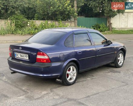 Синий Опель Вектра, объемом двигателя 1.8 л и пробегом 260 тыс. км за 1750 $, фото 3 на Automoto.ua