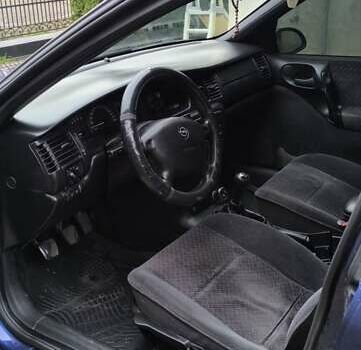 Синій Опель Вектра, об'ємом двигуна 2 л та пробігом 240 тис. км за 2600 $, фото 6 на Automoto.ua