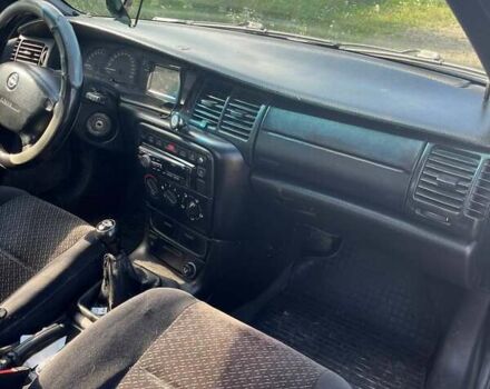Синій Опель Вектра, об'ємом двигуна 2 л та пробігом 354 тис. км за 2300 $, фото 5 на Automoto.ua