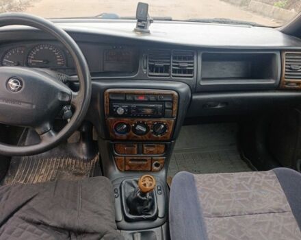 Синій Опель Вектра, об'ємом двигуна 1.7 л та пробігом 300 тис. км за 1190 $, фото 7 на Automoto.ua