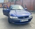 Синій Опель Вектра, об'ємом двигуна 1.8 л та пробігом 247 тис. км за 1999 $, фото 7 на Automoto.ua