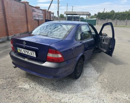 Синій Опель Вектра, об'ємом двигуна 1.8 л та пробігом 247 тис. км за 1999 $, фото 6 на Automoto.ua