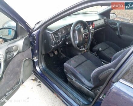 Синий Опель Вектра, объемом двигателя 1.8 л и пробегом 350 тыс. км за 1550 $, фото 2 на Automoto.ua