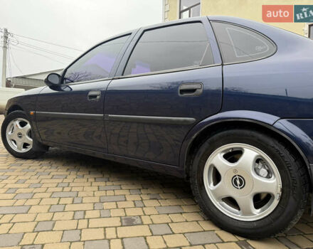 Синій Опель Вектра, об'ємом двигуна 2 л та пробігом 248 тис. км за 2550 $, фото 33 на Automoto.ua