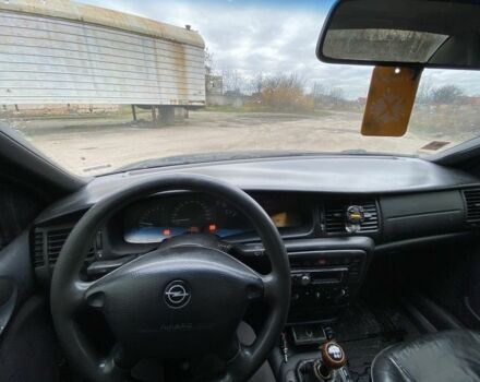 Синий Опель Вектра, объемом двигателя 1.8 л и пробегом 100 тыс. км за 1750 $, фото 6 на Automoto.ua