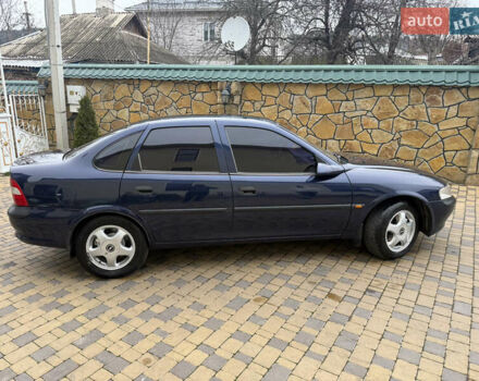 Синій Опель Вектра, об'ємом двигуна 2 л та пробігом 248 тис. км за 2550 $, фото 23 на Automoto.ua
