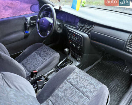 Синій Опель Вектра, об'ємом двигуна 2 л та пробігом 248 тис. км за 2550 $, фото 29 на Automoto.ua