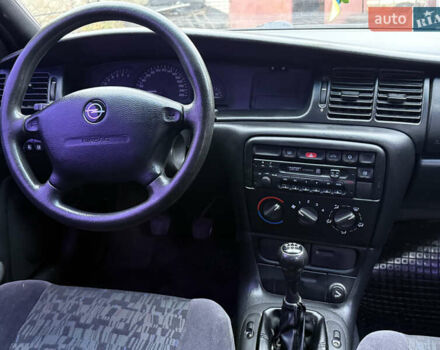 Синій Опель Вектра, об'ємом двигуна 2 л та пробігом 248 тис. км за 2650 $, фото 22 на Automoto.ua