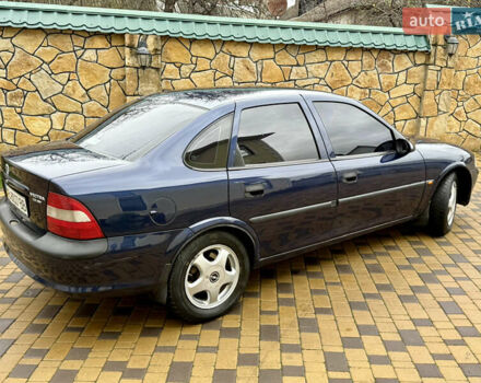 Синій Опель Вектра, об'ємом двигуна 2 л та пробігом 248 тис. км за 2550 $, фото 5 на Automoto.ua