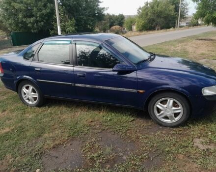 Синій Опель Вектра, об'ємом двигуна 2.5 л та пробігом 250 тис. км за 1919 $, фото 3 на Automoto.ua