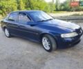 Синий Опель Вектра, объемом двигателя 2 л и пробегом 310 тыс. км за 2500 $, фото 1 на Automoto.ua