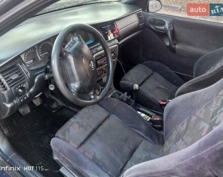 Синий Опель Вектра, объемом двигателя 1.8 л и пробегом 350 тыс. км за 1550 $, фото 3 на Automoto.ua