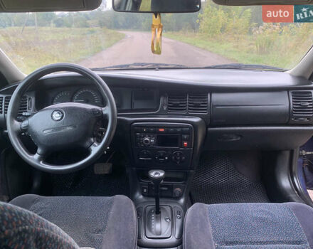 Синий Опель Вектра, объемом двигателя 2 л и пробегом 358 тыс. км за 3000 $, фото 10 на Automoto.ua