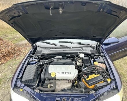 Синий Опель Вектра, объемом двигателя 1.8 л и пробегом 250 тыс. км за 2900 $, фото 6 на Automoto.ua